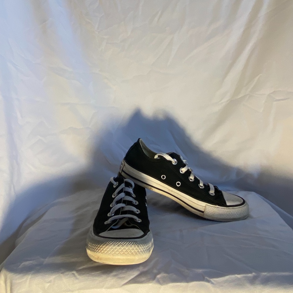 Black low top Converse shoes